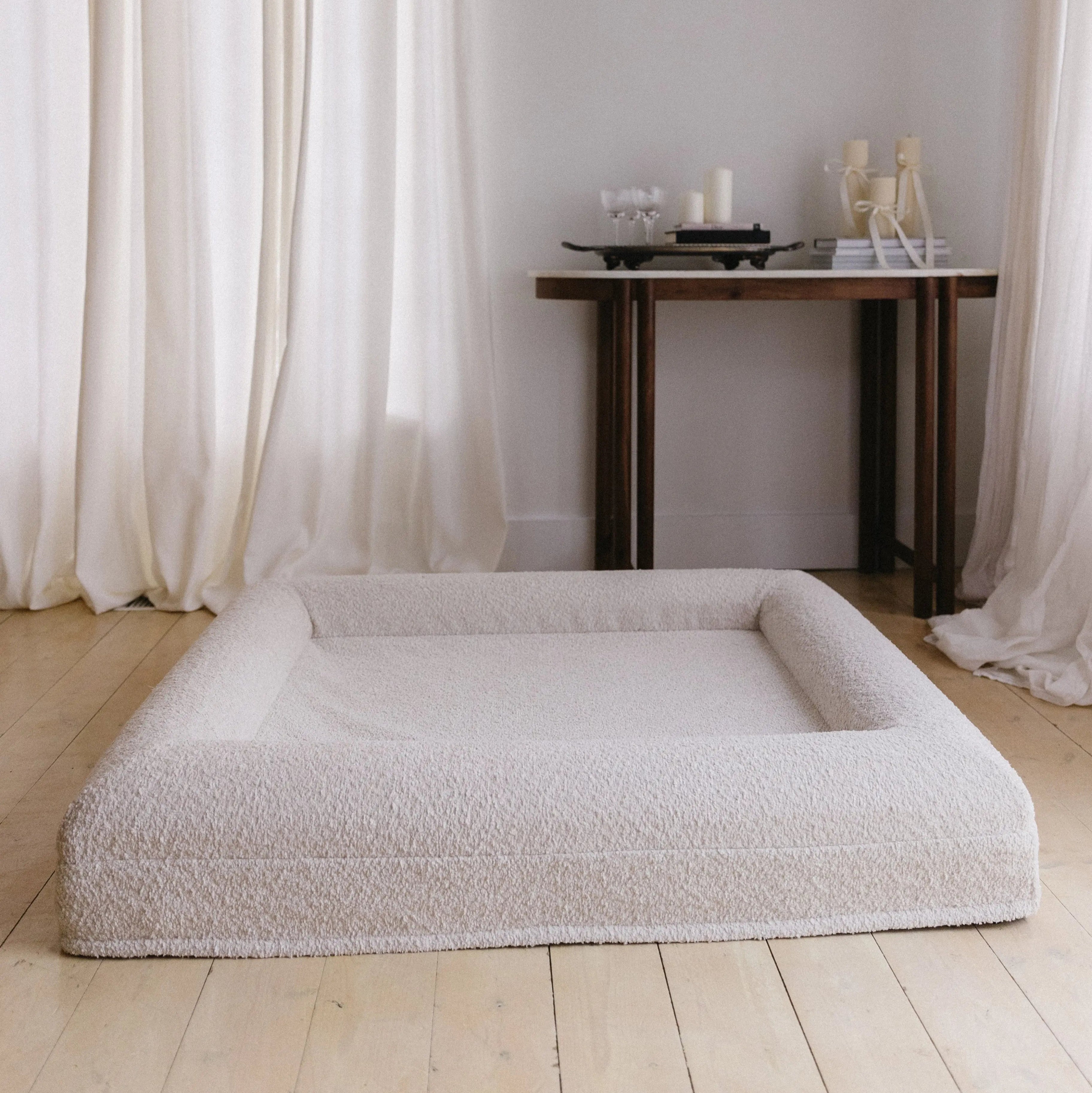 Image of Medium/Large Bouclé Dog Bed with cream boucle fabric and memory foam, styled in a modern living room setting
